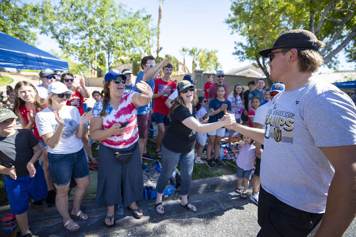 Vegas Golden Knight Zach Whitecloud greets parade-goers at the 29th annual Summerlin Council Pa ...