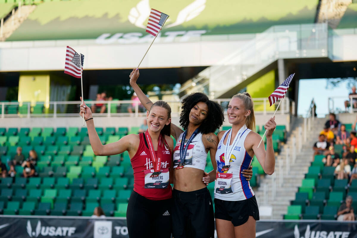 Vashti Cunningham, center, who won the gold medal for the women's high jump, poses with silver ...