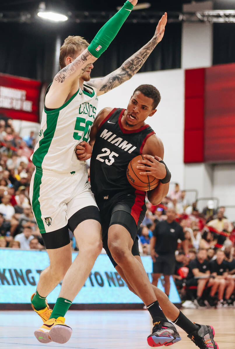 Miami Heat center Orlando Robinson(25) tries to get past Boston Celtics center Olek Balcerowski ...