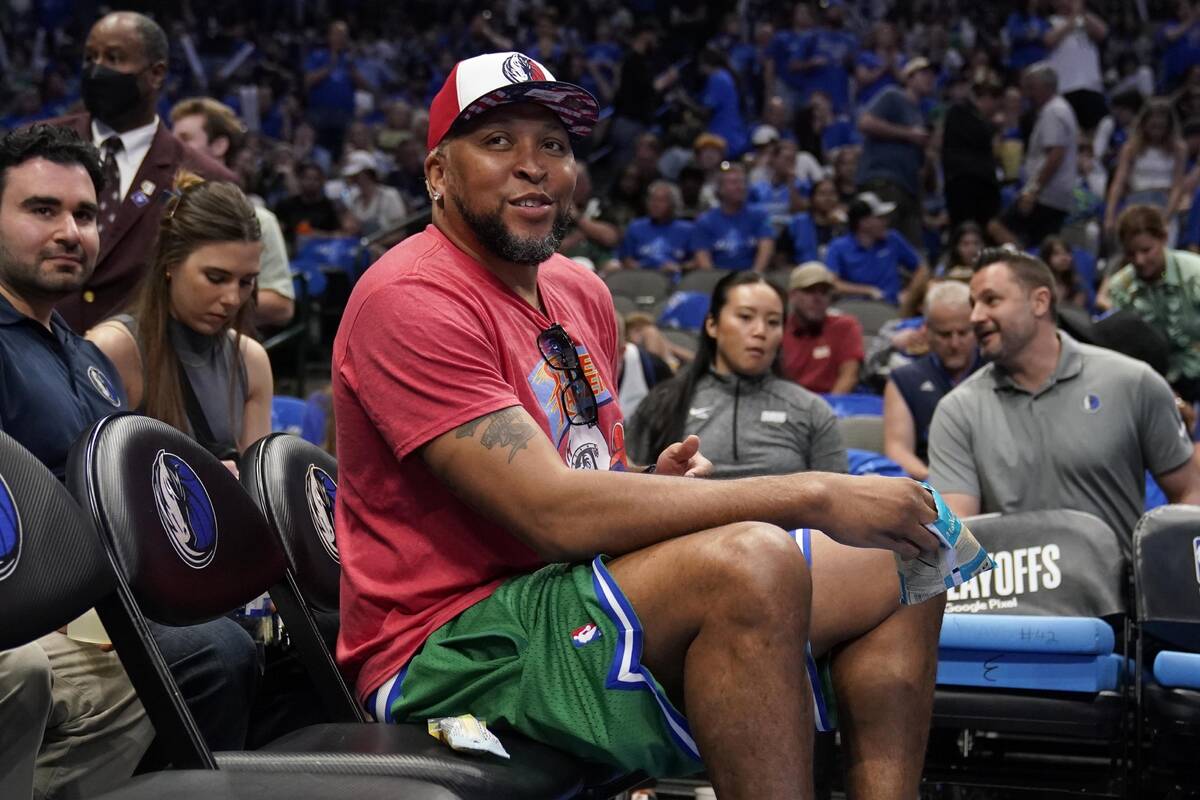 Former Dallas Mavericks player Shawn Marion watches play against the Phoenix Suns during Game 4 ...