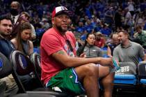 Former Dallas Mavericks player Shawn Marion watches play against the Phoenix Suns during Game 4 ...