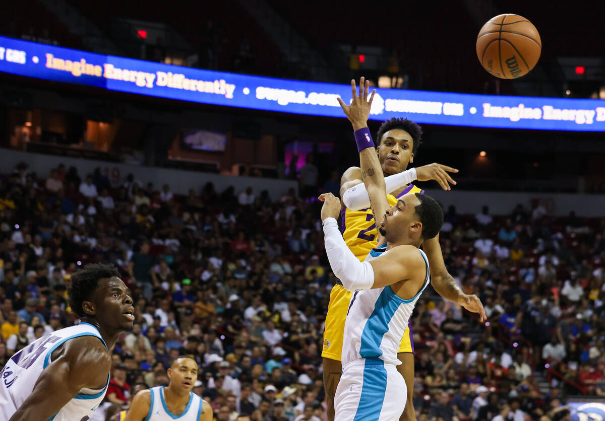 Los Angeles Lakers forward Maxwell Lewis (21) passes the ball during an NBA Summer League game ...