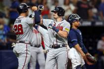 Atlanta Braves' Sean Murphy, right front, celebrates his three-run home run with Matt Olson (28 ...