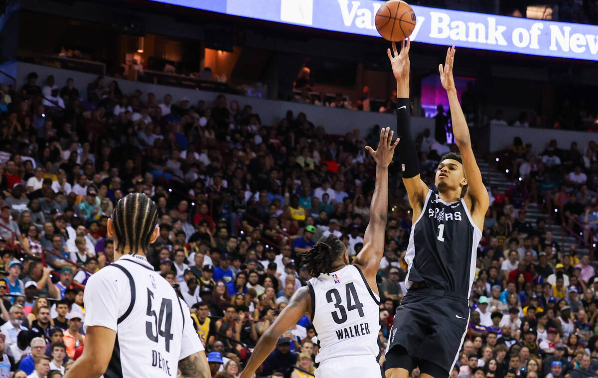 San Antonio Spurs forward Victor Wembanyama (1) shoots a three pointer during an NBA Summer Lea ...