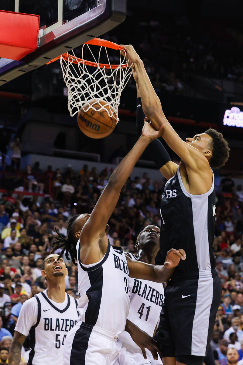 San Antonio Spurs forward Victor Wembanyama (1) dunks the ball during an NBA Summer League game ...