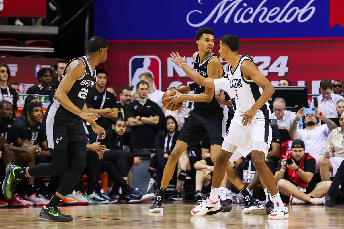 San Antonio Spurs forward Victor Wembanyama (1) looks to pass the ball during an NBA Summer Lea ...