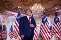 FILE - Former U.S. President Donald Trump arrives on stage to speak during an event at his Mar- ...