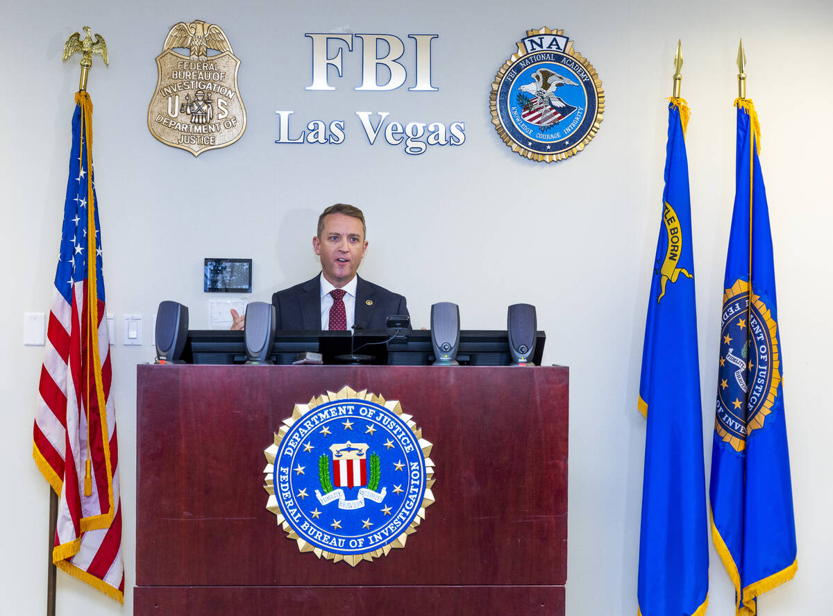 Special Agent in Charge Spencer Evans with the Nevada office of the FBI talks during a press co ...