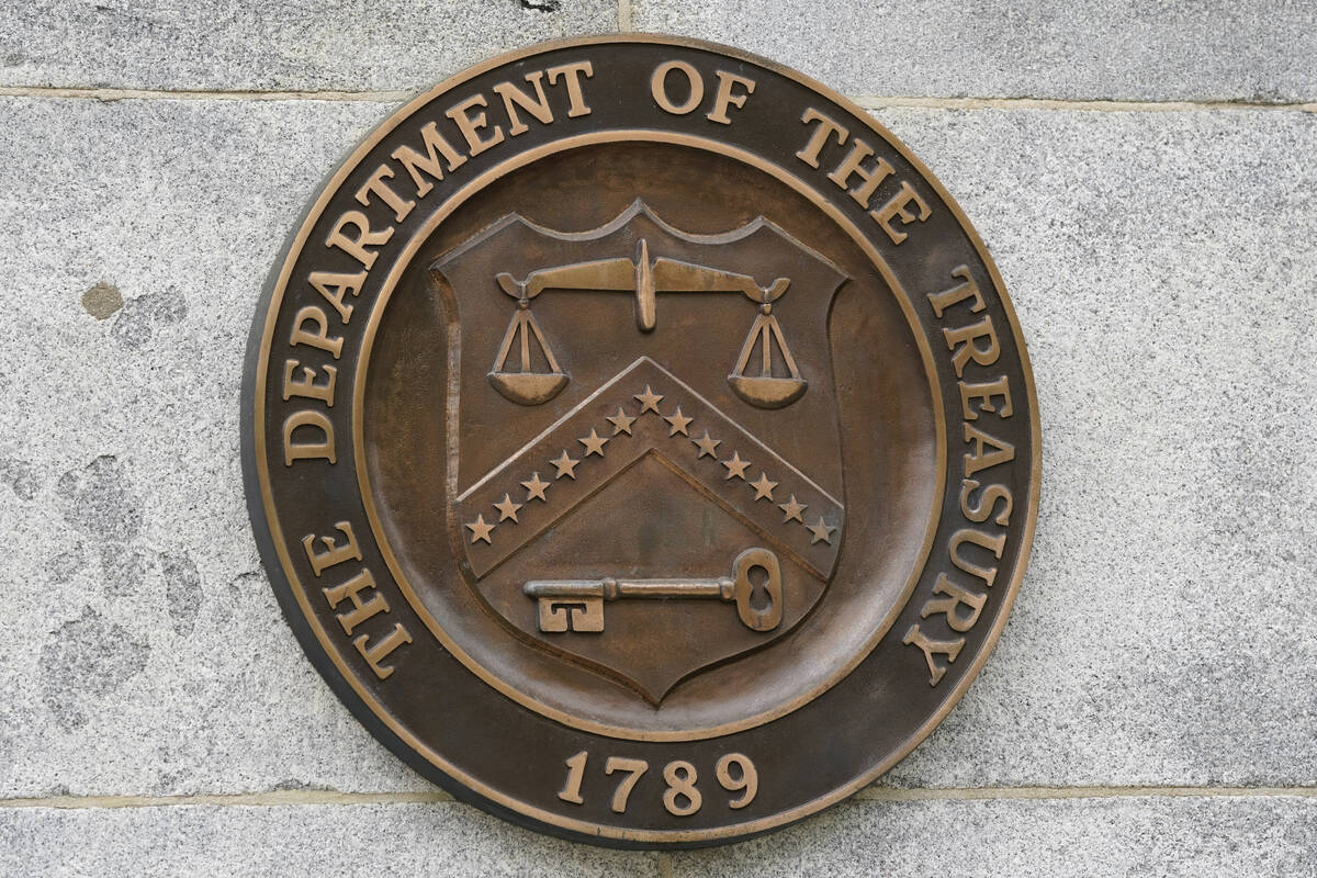 The Department of the Treasury's seal outside the Treasury Department building in Washington on ...