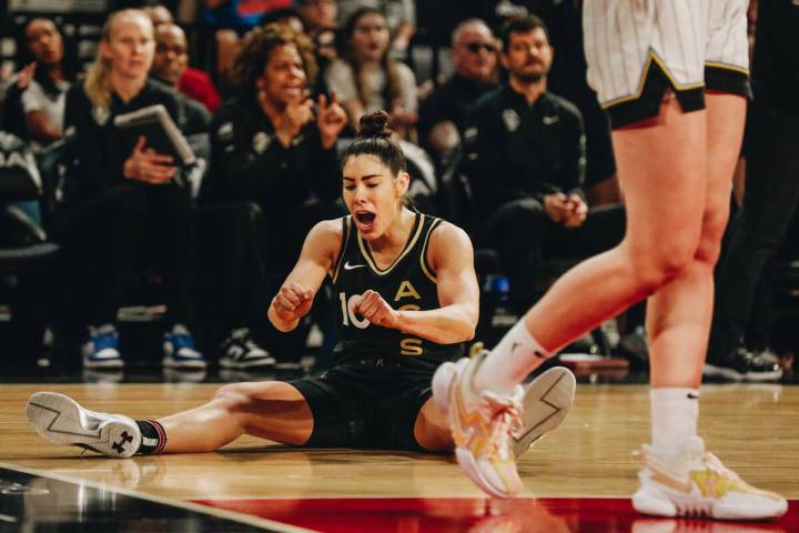 Las Vegas Aces guard Kelsey Plum (10) reacts after falling during a game against the Chicago Sk ...