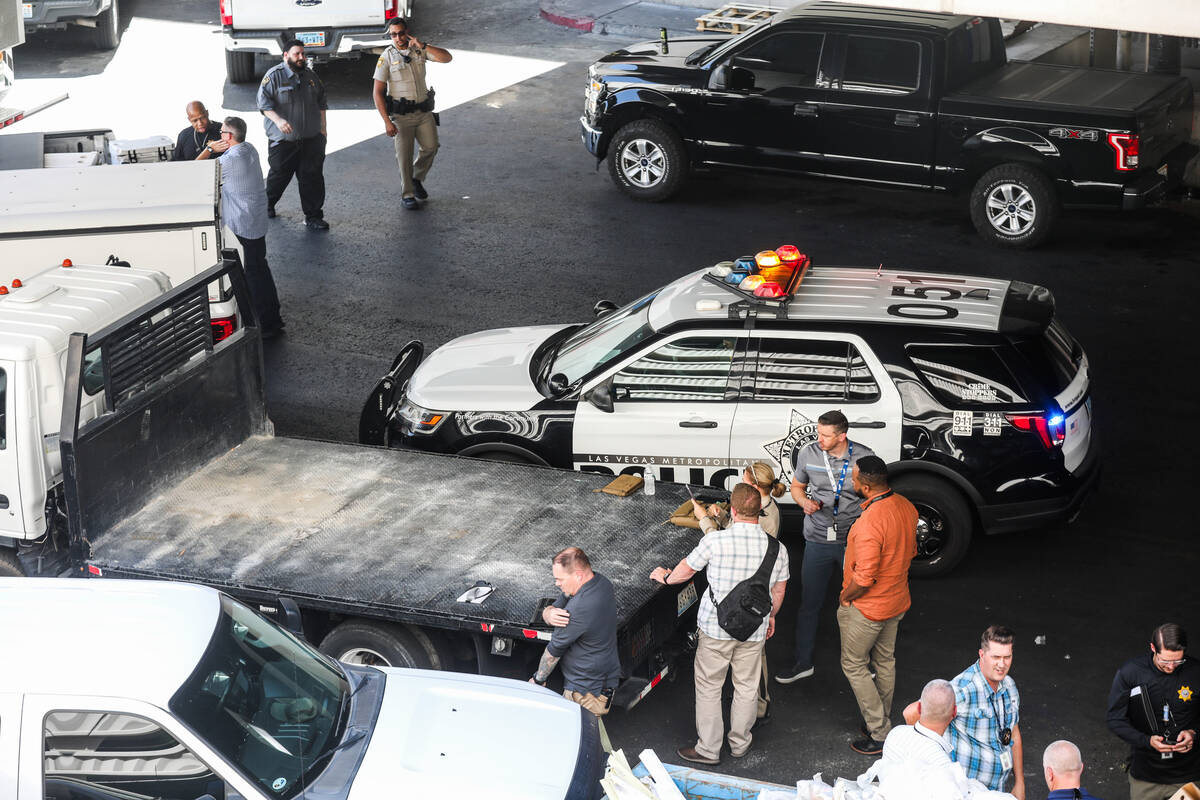 Police presence where a man is holding a woman hostage in a hotel room at Caesars Palace in Las ...