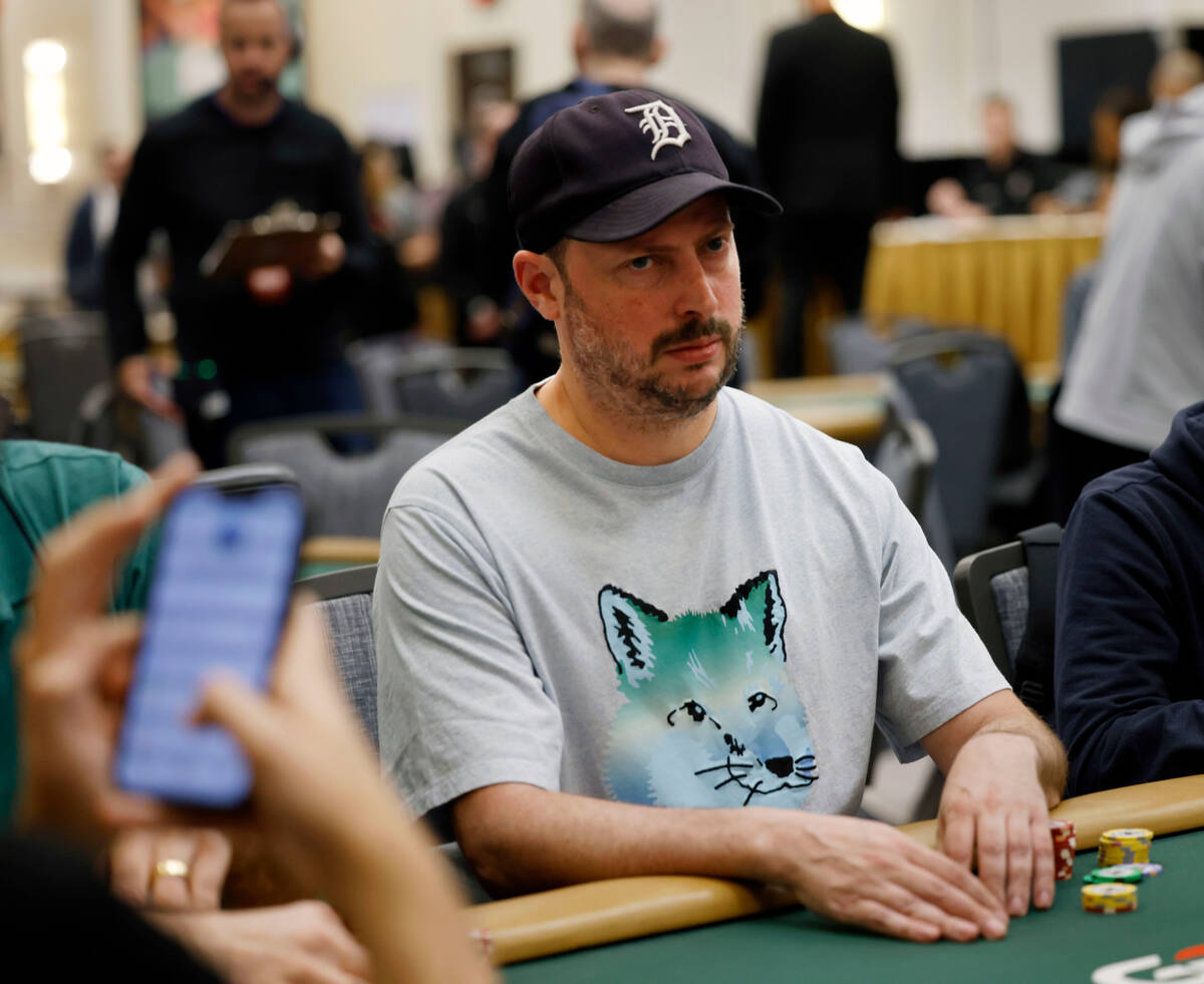 Nate Silver competes with other players during World Series of Poker $10,000 buy-in No-limit Ho ...