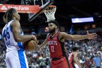 Houston Rockets guard Trevor Hudgins (12) defends against Oklahoma City Thunderguard Jahmi&#x20 ...
