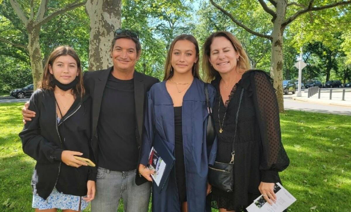 Mikala Jones is seen in New York in June 2022 with his daughter Violet, left, and on the right, ...