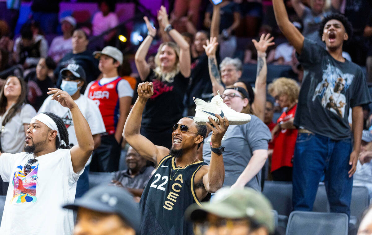 Aces fans go a bit wild for another shoe give-away as they blow out the Phoenix Mercury during ...