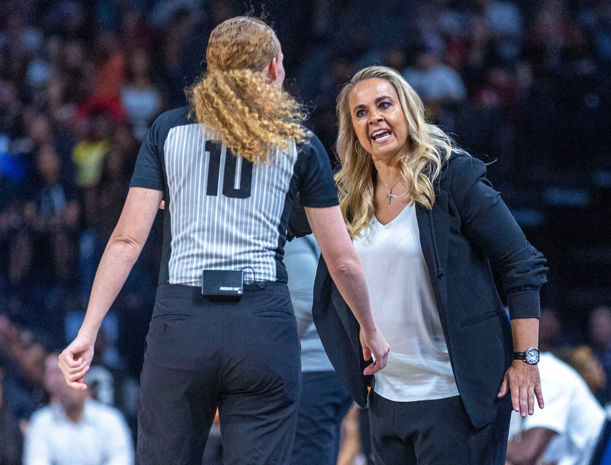 Aces head coach Beck Hammon argues a foul call with a referee which battling the Phoenix Mercur ...