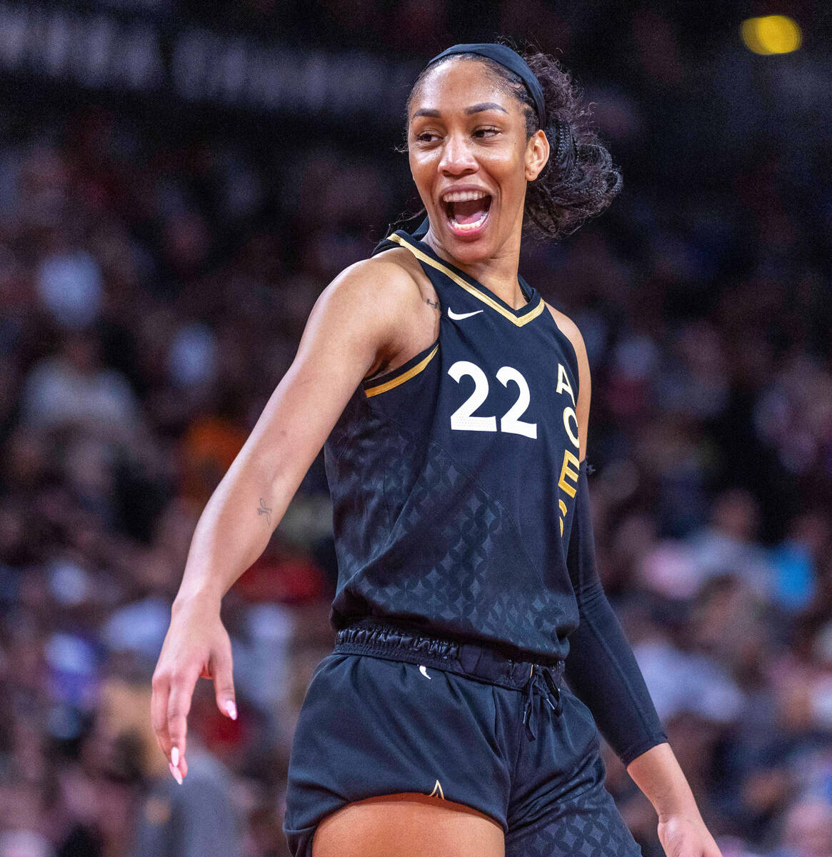 Aces forward A'ja Wilson (22) is happy with her teams domination of the Phoenix Mercury during ...