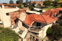 This photo shot with a drone shows damage from earth movement to a property in Rolling Hills Es ...