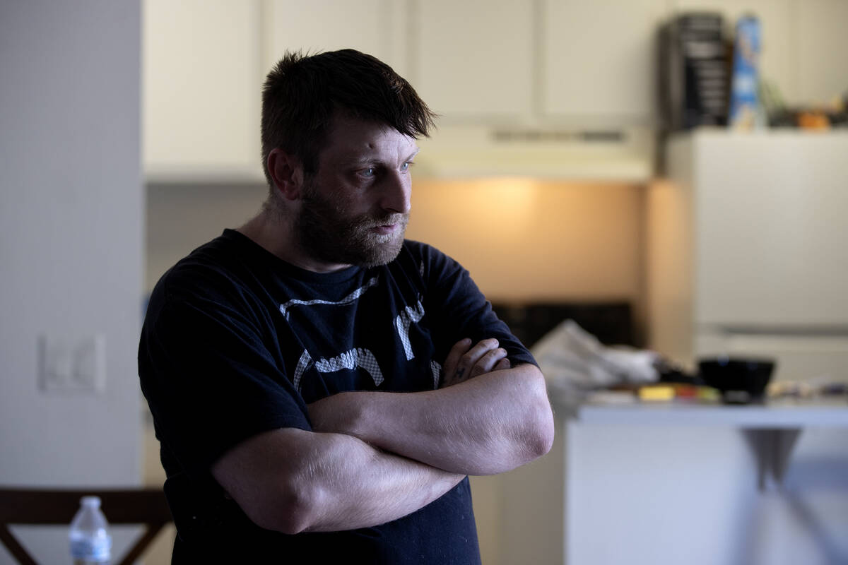 Justin Phillips, whose apartment was destroyed in a June 6 fire at the Tides on Charleston, rec ...