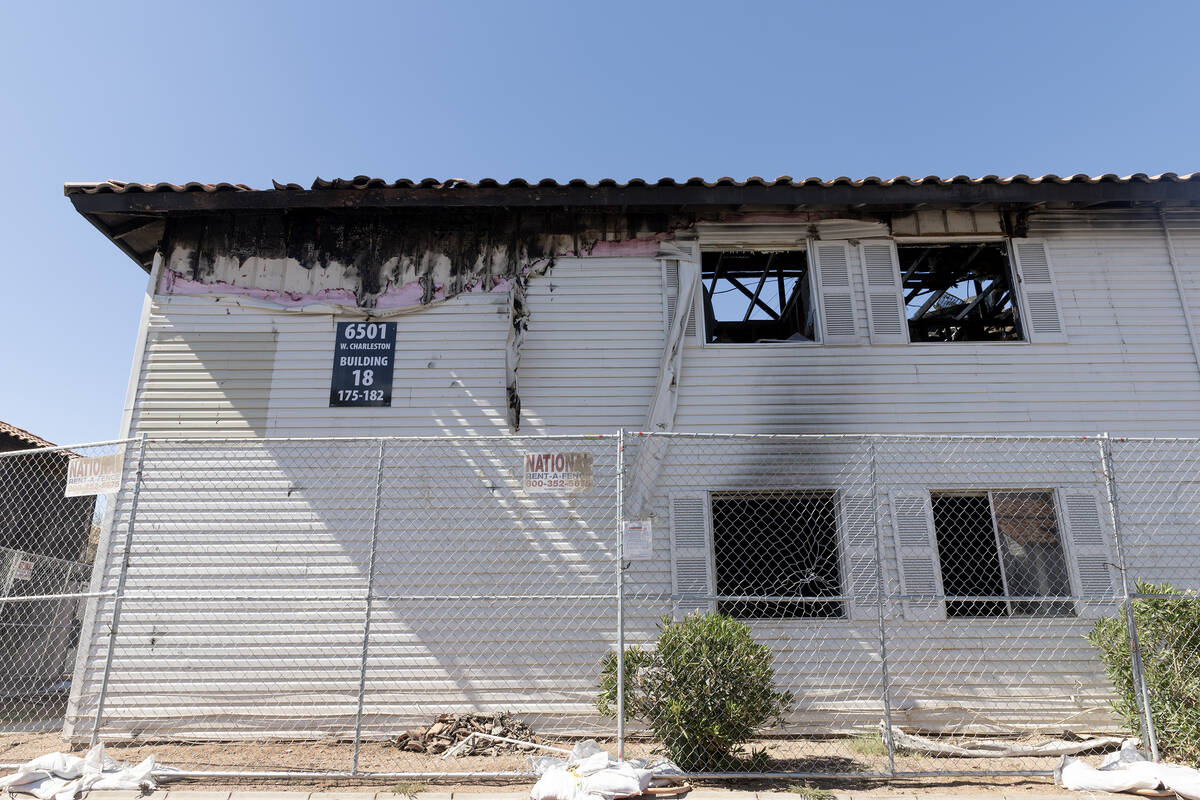 Fire-damaged units are fenced off at the Tides on Charleston on Wednesday, July 19, 2023, in La ...