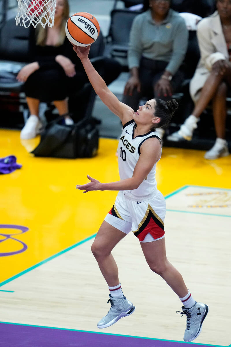 Las Vegas Aces guard Kelsey Plum (10) shoots during the first half of a WNBA basketball game ag ...
