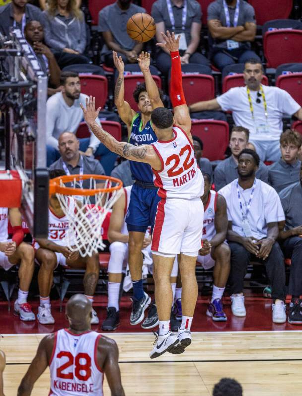 Minnesota Timberwolves guard D.J. Carton (16) elevates to shoot a 3-point basket over Atlanta H ...