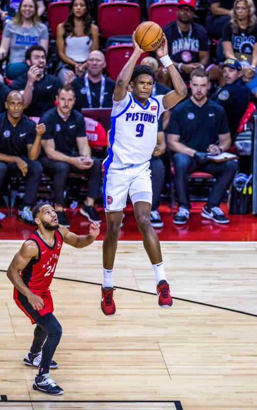Detroit Pistons guard Ausar Thompson (9) goes up high for a late pass when a shot is unavailabl ...