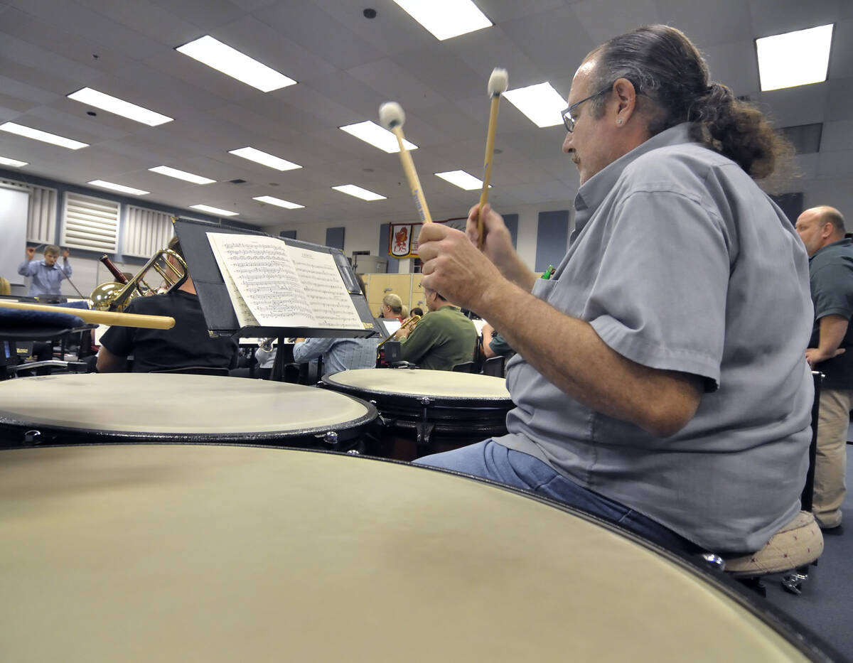 John Nasshan plays timpani during a Henderson Symphony Orchestra rehearsal in the band room at ...