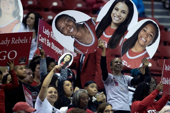 The UNLV Lady Rebels fan section cheers for their team during the first half of a Mountain West ...