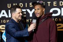 Devin Haney speaks with emcee Mark Shunock after arriving to MGM Grand ahead of his Saturday ni ...