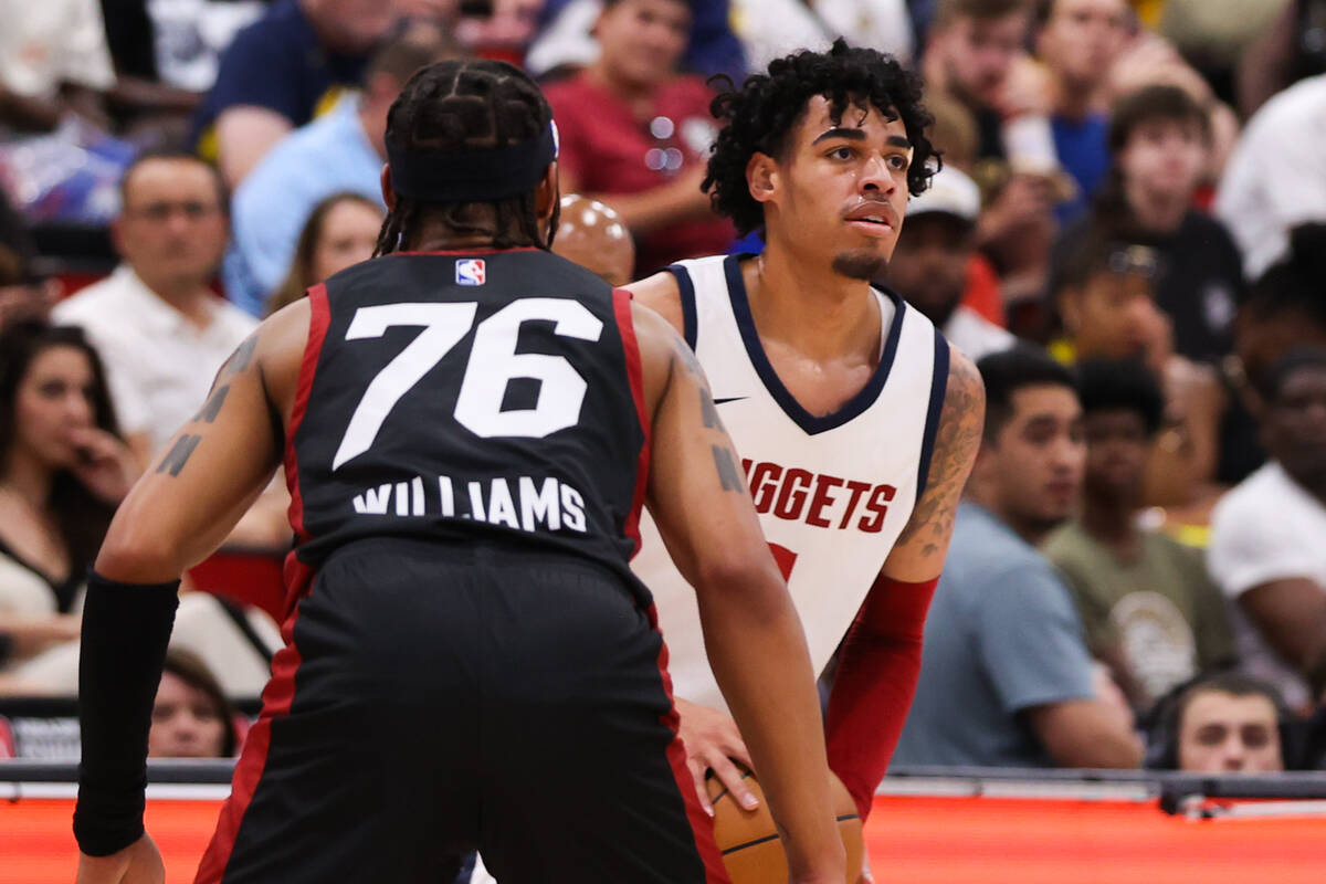 Denver Nuggets guard Julian Strawther (3) looks to pass the ball during an NBA Summer League ga ...
