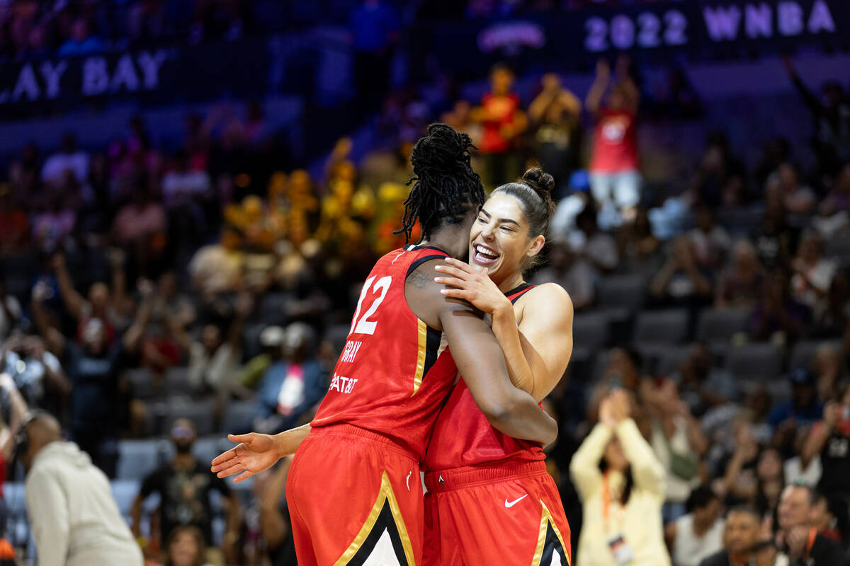 Las Vegas Aces guards Chelsea Gray and Kelsey Plum embrace as they win the WNBA All-Star skills ...