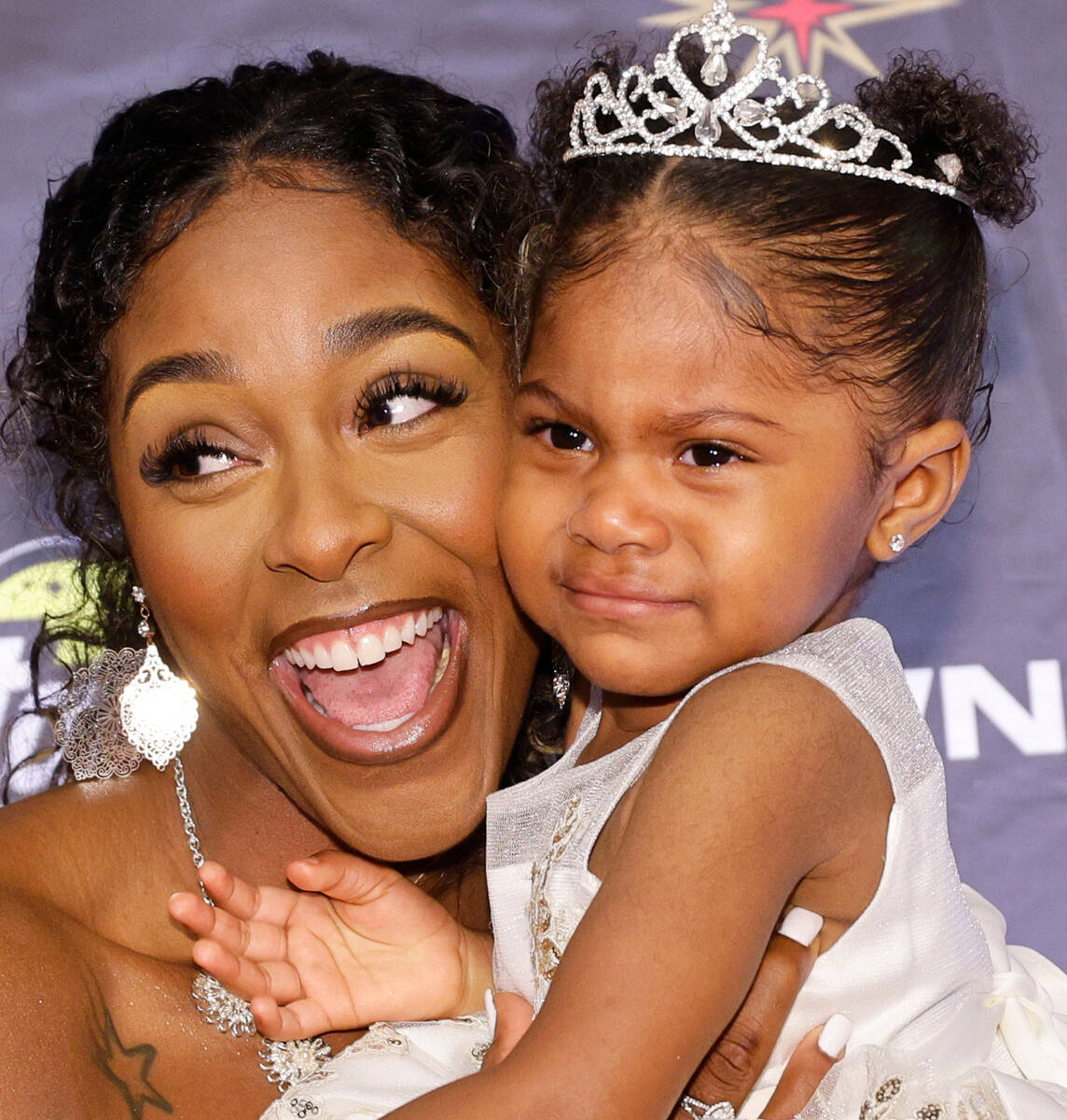 Cheyenne Parker of Atlanta Dream poses for a photo with her daughter Naomi Tyus, 18 month-old, ...