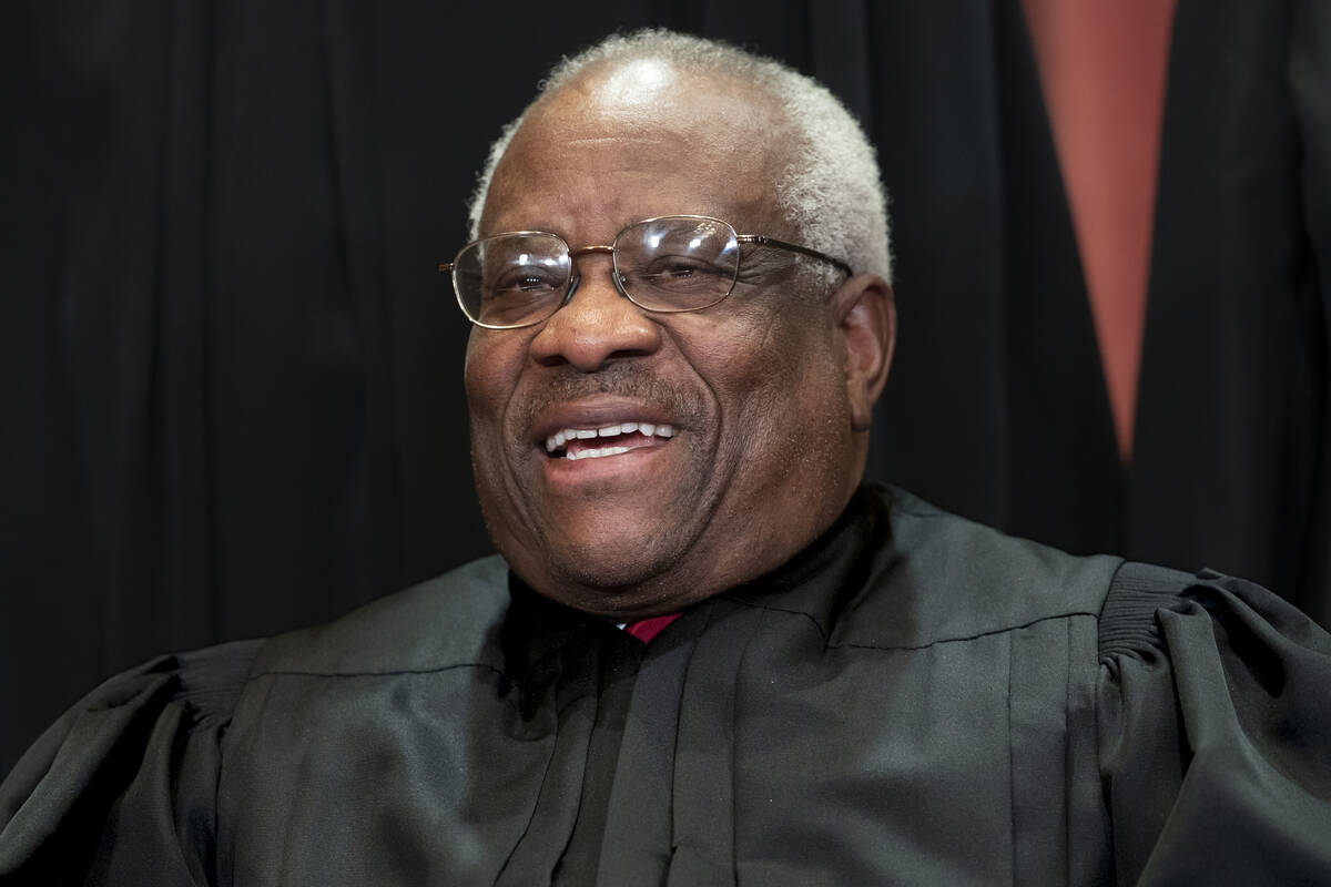 FIILE - In this Nov. 30, 2018, file photo, Supreme Court Associate Justice Clarence Thomas, app ...