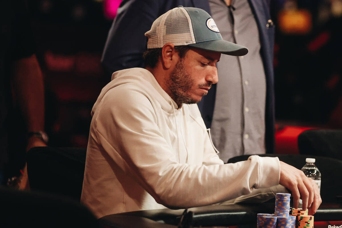 Daniel Weinman stacks his chips during the World Series of Poker $10,000 buy-in No-limit Hold-e ...