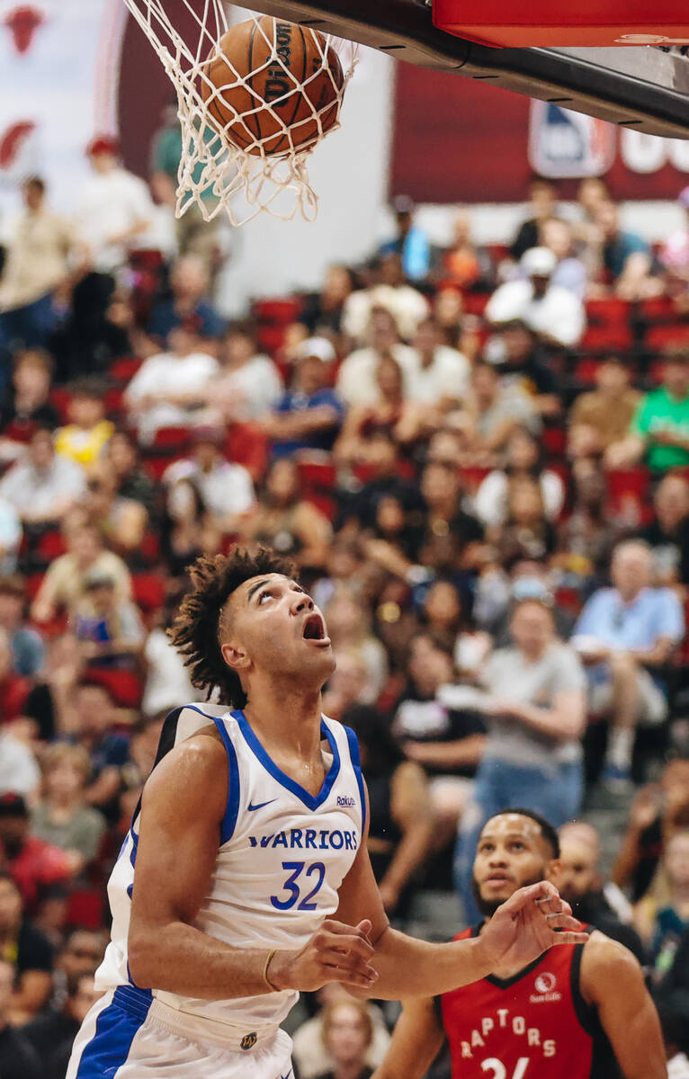 Golden State Warriors forward/center Trayce Jackson-Davis watches the ball go into the basket d ...