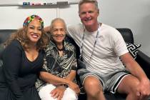 Michelle Johnson, left, and Warriors head coach Steve Kerr are shown with Michelle's mother and ...