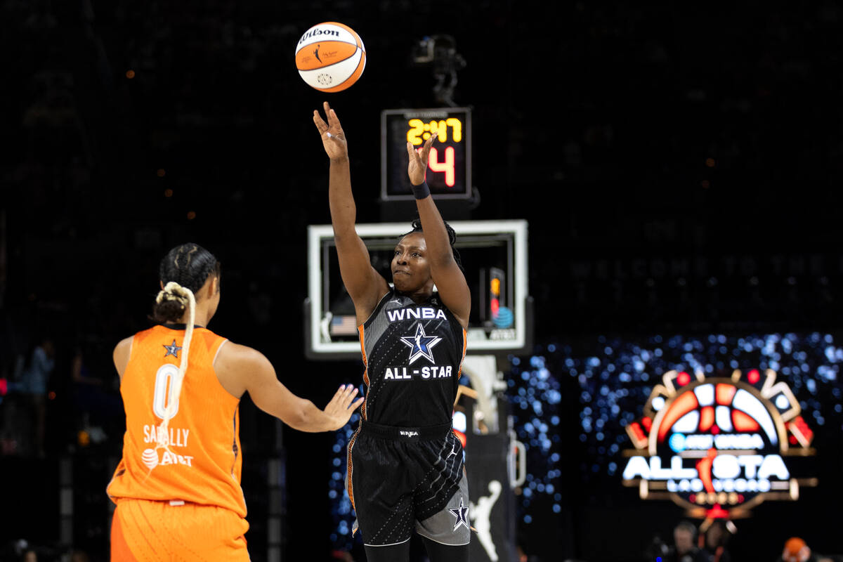 Las Vegas Aces' Chelsea Gray, of Team Wilson, shoots against Dallas Wings’ Satou Sabally ...