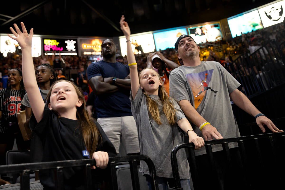 Young fans cheer during the second half of a WNBA All-Star basketball game at Michelob ULTRA Ar ...