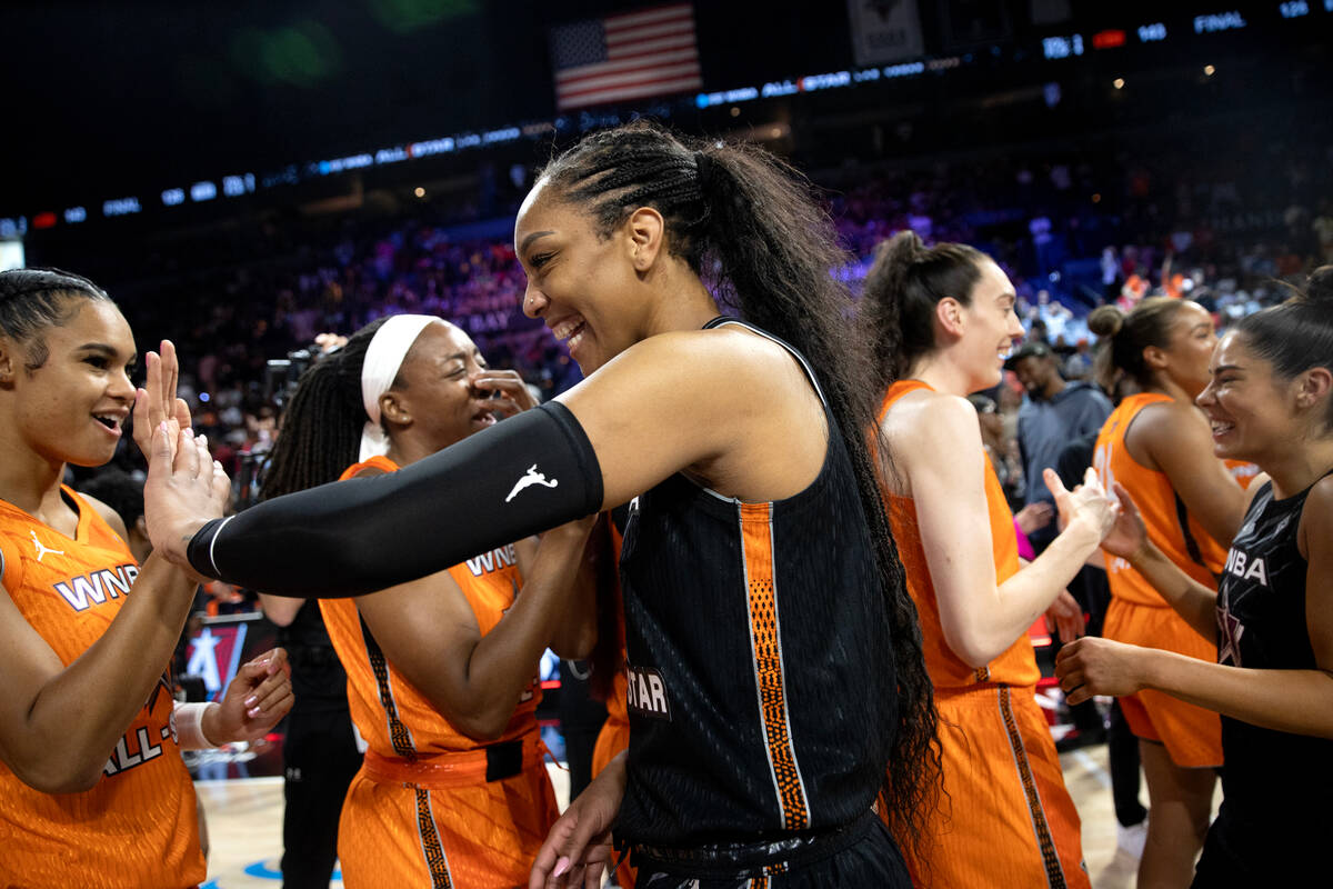 Las Vegas Aces' A'ja Wilson, who captained Team Wilson, congratulates Team Stewart after they w ...