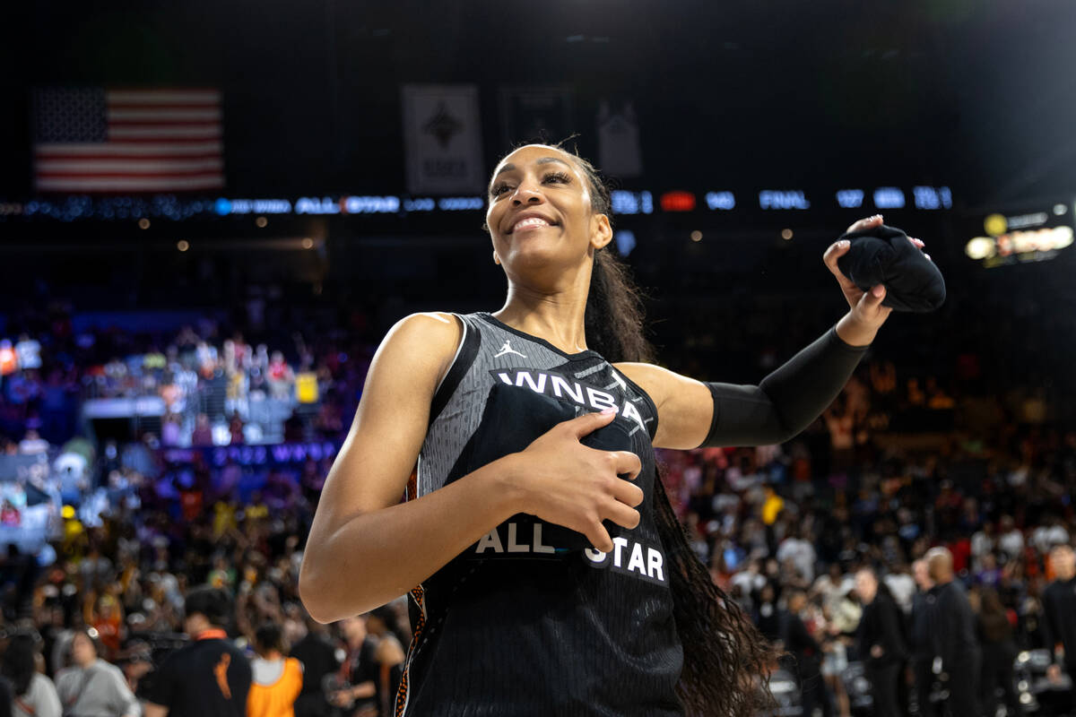Las Vegas Aces' A'ja Wilson, captain of Team Wilson, throws t-shirts to fans after the WNBA All ...