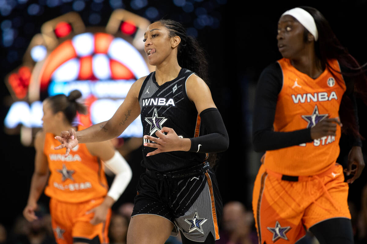 Las Vegas Aces' A'ja Wilson, of Team Wilson, gestures after scoring a three-pointer against Tea ...