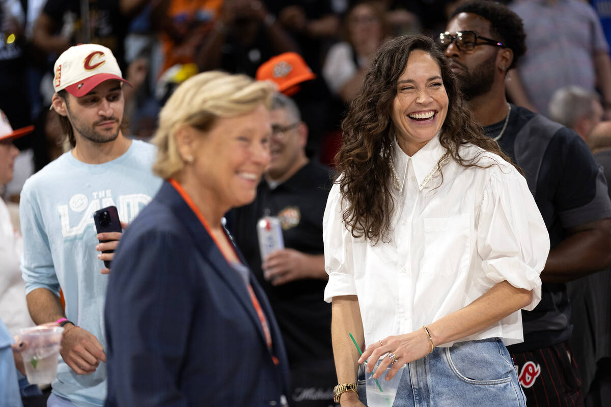 Former WNBA player Sue Bird laughs while attending the WNBA All-Star basketball game at Michelo ...