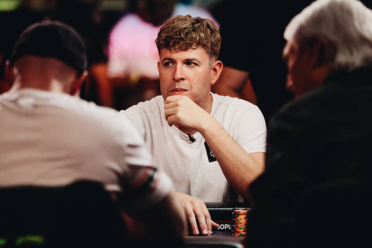 Adam Walton watches a competitor during the $10,000 buy-in No-limit Hold’em World Champi ...