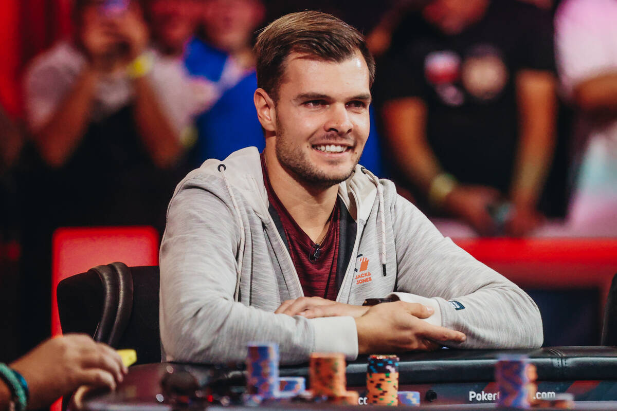 Daniel Holzner smiles at a competitor during the $10,000 buy-in No-limit Hold’em World C ...