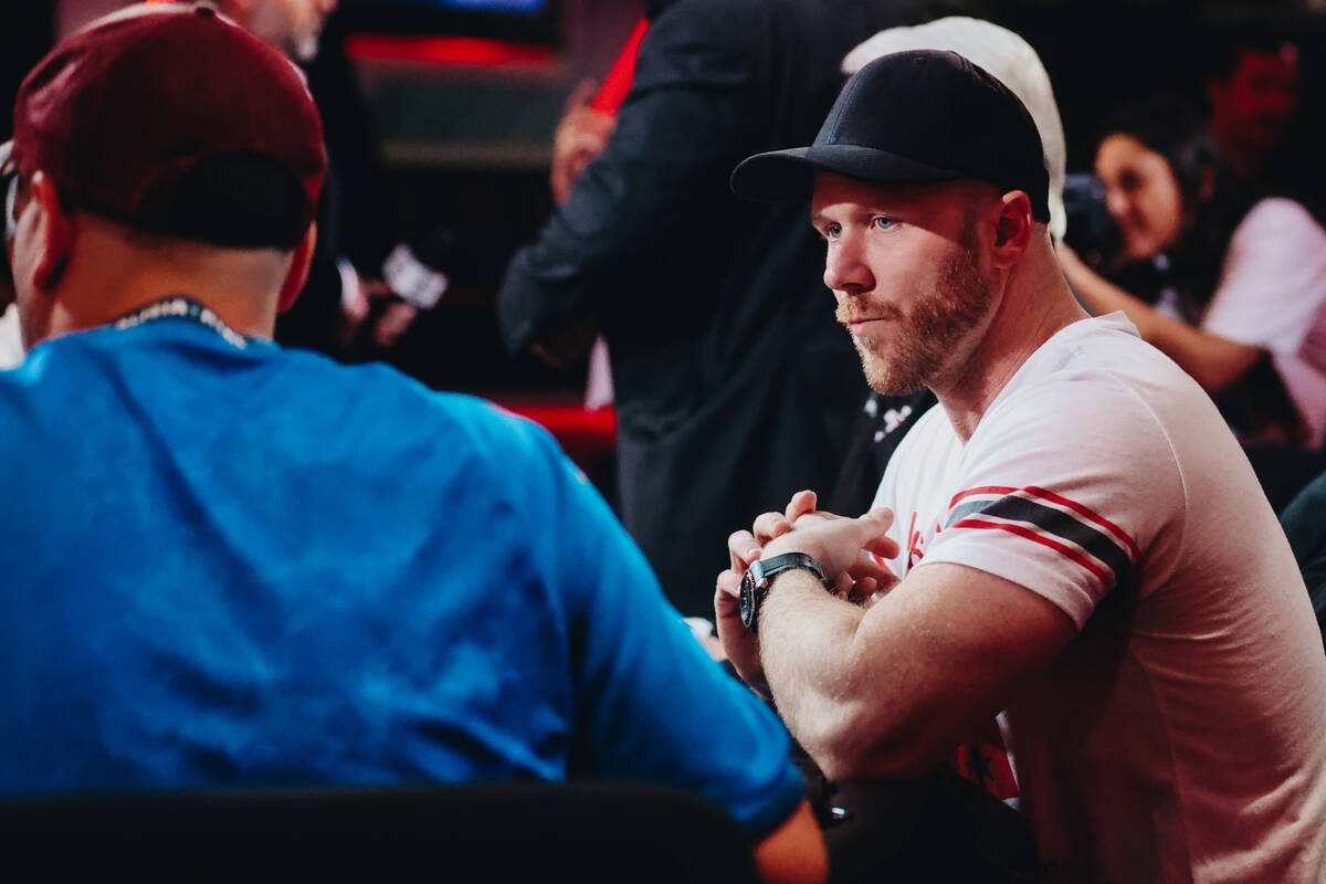 Steven Jones, right keeps an eye on competitor Juan Maceiras during the $10,000 buy-in No-limit ...