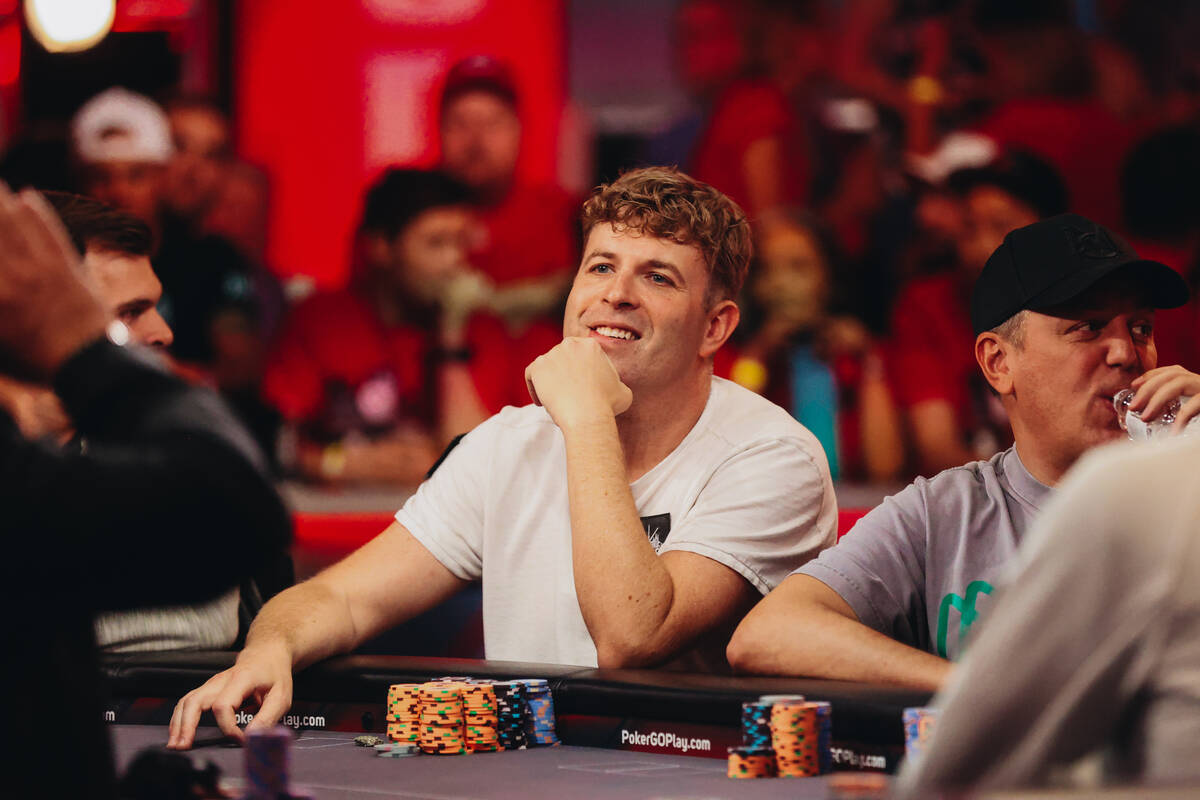 Henderson resident Adam Walton ssmiles during the $10,000 buy-in No-limit Hold’em World ...