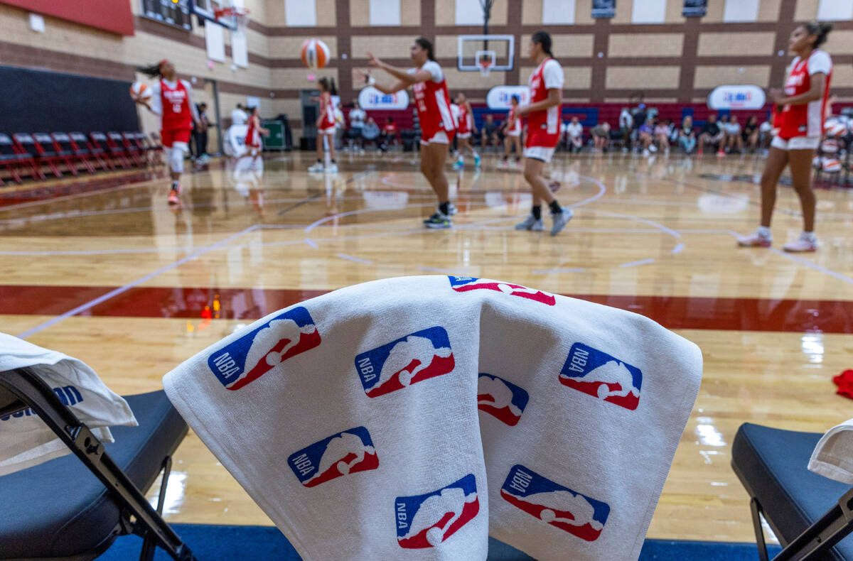 Nation Williams and teammates warm up for a Jr.NBA showcase scrimmage of U.S players versus int ...
