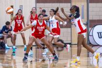 Nation Williams (44), center, holds her position as Qandace Samuels (20) passes away from her d ...