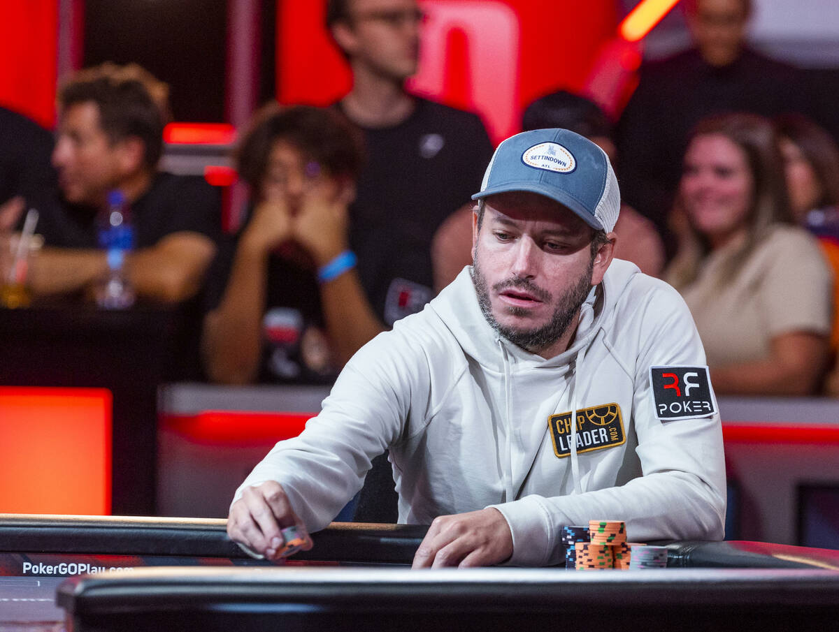 Daniel Weinman makes a bet during play of the remaining pair on the final day at the World Seri ...